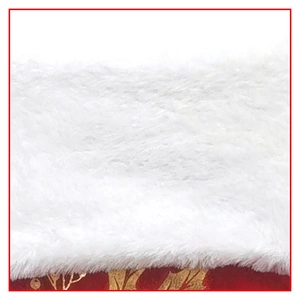 Close-up of fluffy white faux fur trim on a red festive Christmas stocking detail