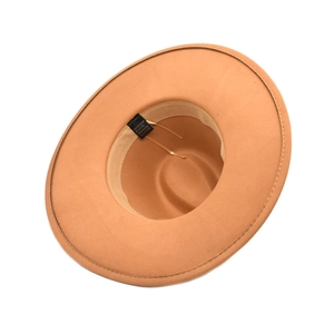 Detail of camel wool fedora hat showing wide brim and inner adjustable cotton sweatband