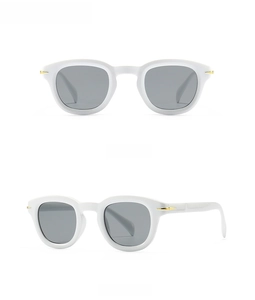 Front and 45-degree side view of ivory round sunglasses with gold rivet accents