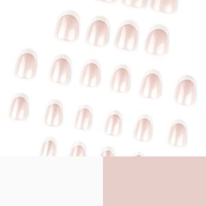 French tip press-on nails in white and nude pink, short round minimalist pearlescent style