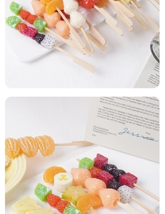 Detailed view of artificial mixed fruit skewers with realistic strawberry and kiwi textures