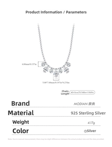 Macro detail of 925 sterling silver necklace with clear round and teardrop crystals