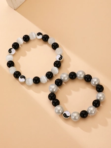 Set de pulseras de cuentas yin yang en negro, blanco y plata para parejas estilo