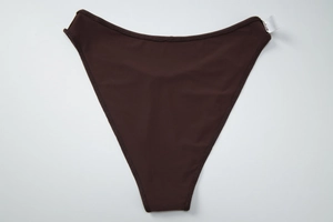 Detailed close-up of dark brown high-waisted bikini bottoms with elastic fabric texture