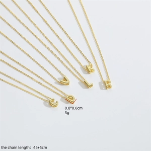 Minimalist gold 26 initial letter necklaces with delicate cross chain and tiny pendants