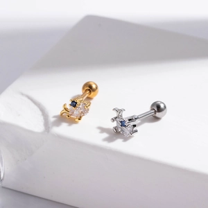 Surgical steel stud earrings with zircon animal design in gold and silver finish