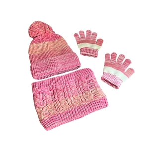 Detailed view of pink and orange gradient knit hat, scarf and gloves set for kids