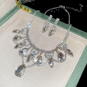 Sparkling waterdrop crystal necklace and earrings set showcased in a premium gift box