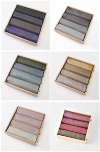 Detailed grid of solid color scarves with metallic glitter finish in 24 distinct shades