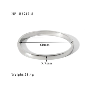 Polished silver stainless steel cuff bracelet with 60mm diameter and 5.7mm width details