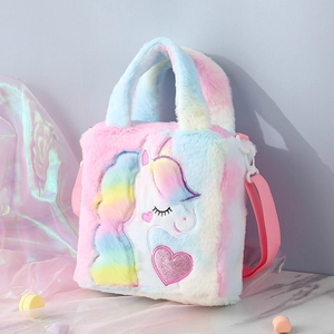 Detail view of plush unicorn shoulder bag with macaron gradient faux fur and embroidery
