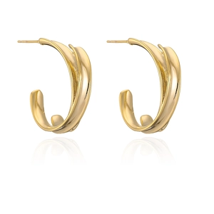 Modern twisted gold plated C-shaped hoop earrings with a polished metallic finish