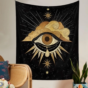 Detail of mystic eye tapestry with gold clouds and We See You quote on white wall
