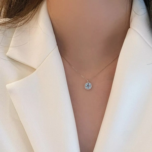 Elegant 925 sterling silver necklace with a square aquamarine pendant and pavé diamonds