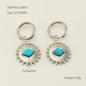 Detail view of sunflower earrings in stainless steel with turquoise stone and dimensions
