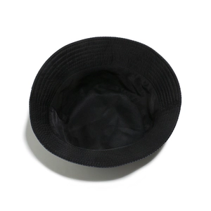 Detail view of the durable fabric interior and reinforced stitching of a black bucket hat
