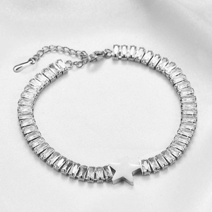 Detail of 12mm stainless steel bracelet with star charm and rectangular zircon stones
