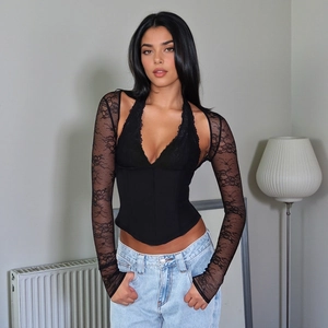 Slim fit black halter top with lace long sleeves and floral embroidery detailing