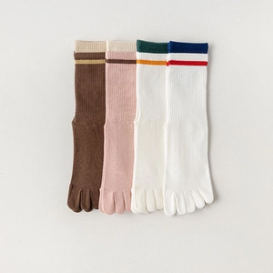 Set of four cotton five-finger yoga socks in brown and beige with striped ribbed cuffs