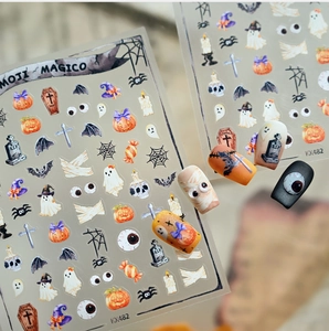 Detailed Halloween nail stickers featuring ghost, pumpkin, and RIP coffin designs