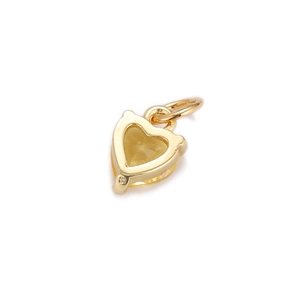 Detailed view of a gold-plated heart pendant featuring a champagne zircon center stone