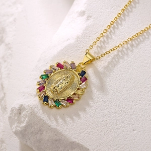 Gold plated 18K necklace with Virgin Mary pendant and colorful zircon stones on stone