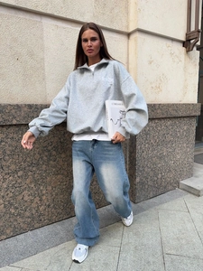 Women's grey oversized half-zip sweatshirt with New York embroidery in a street style look