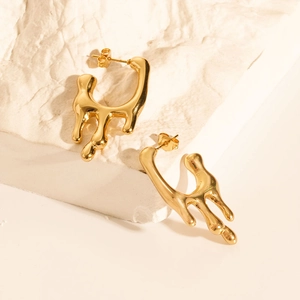 Modern 18K gold-plated stainless steel hoop earrings with liquid lava metal design
