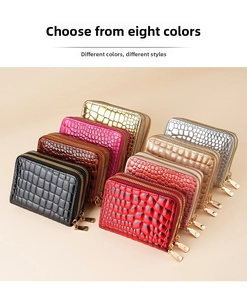 Detail view of double zipper crocodile texture card holders in eight vibrant colors