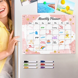 Magnetic acrylic monthly planner on fridge with six colorful dry erase markers