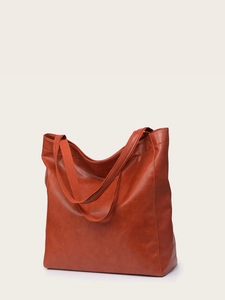 Texture détaillée du cuir PU souple orange-brun du grand sac cabas à bandoulière pour femme