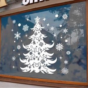 White Christmas tree window decal with snowflakes on a glass door for festive decoration