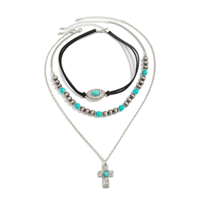 Three-piece layered turquoise necklace set with vintage cross pendant and beaded choker