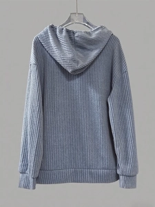 Detailed back view of dusty blue ribbed hoodie featuring drop shoulder and hooded design