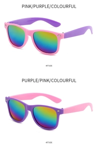 Detail view of pink and purple kids sunglasses with rainbow mirrored lenses at 45 degree angle