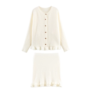 Two-piece white knit set with long-sleeve cardigan and ruffle hem mini skirt