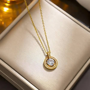 Elegant gold necklace with crystal circle pendant in premium gift box presentation