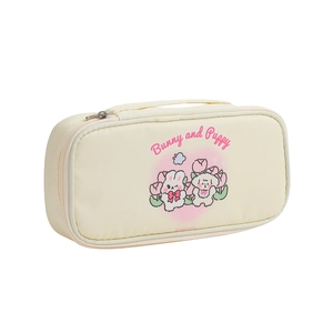 Detail of cream white fabric stationery bag with handle and cute bunny puppy print