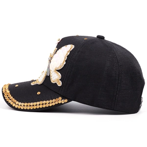 Casquette de baseball en jean noir avec papillon à paillettes et strass brillants