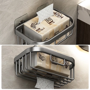 Grey wall-mounted paper towel holder with dual dispensing feature in modern bathroom