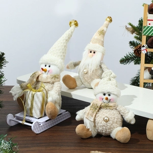 Three-piece set of beige Christmas plush dolls including Santa and snowmen for tree decor
