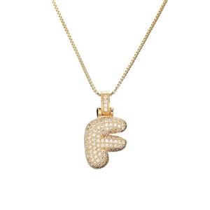 Close-up of a gold bubble letter F pendant necklace with pavé set zircon crystals