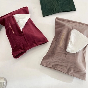 Three-piece set of embroidered velvet tissue pouches in burgundy, pink and dark green