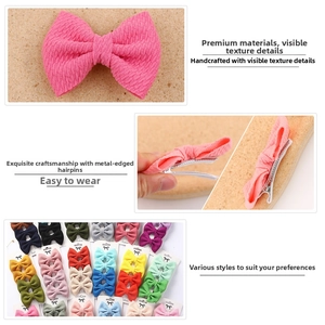 Detail of fabric bow hair clips set with silver metal crocodile clips for baby girls