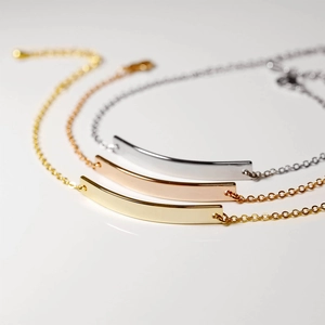 Minimalist curved metal bar bracelet set in gold rose gold and silver finishes