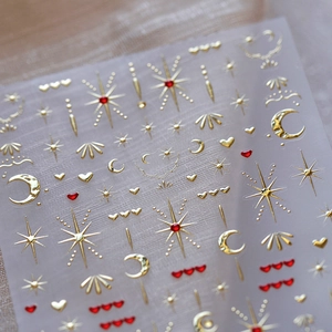 Golden heart moon and star nail art stickers with metallic texture for DIY manicure