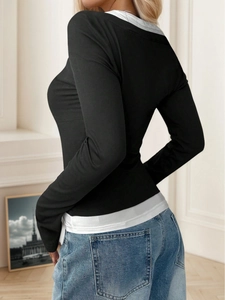 Camiseta entallada de manga larga en blanco y negro con efecto de dos piezas para mujer