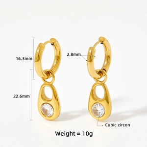 Detail view of gold hoop earrings with cubic zircon pendant and precise measurements