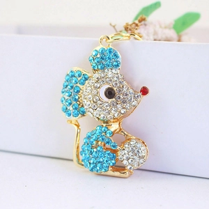 Cute mouse keychain with blue and clear rhinestones on a gold-plated metal alloy base