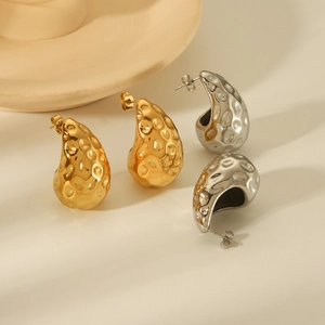 Textured 18K gold and silver stainless steel teardrop earrings with hammered finish